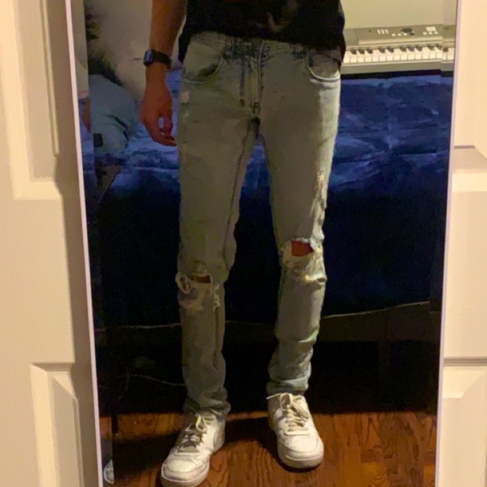 skinny white washed ripped jeans
